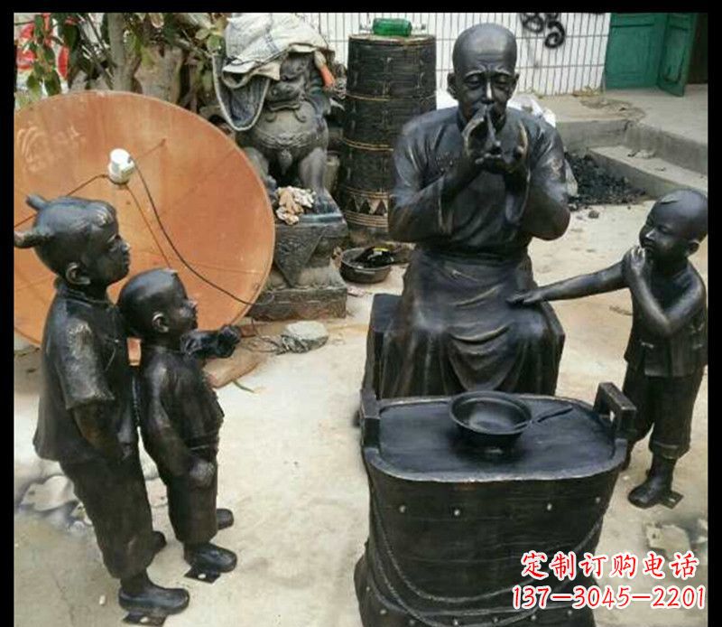 宜宾步行街吹糖人的人物铜雕