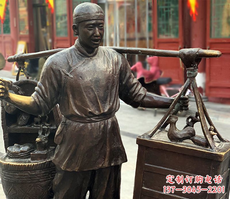 宜宾铜雕步行街卖货郎人物雕塑