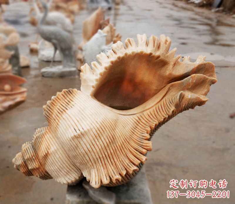 宜宾晚霞红海螺石雕广场景观雕塑
